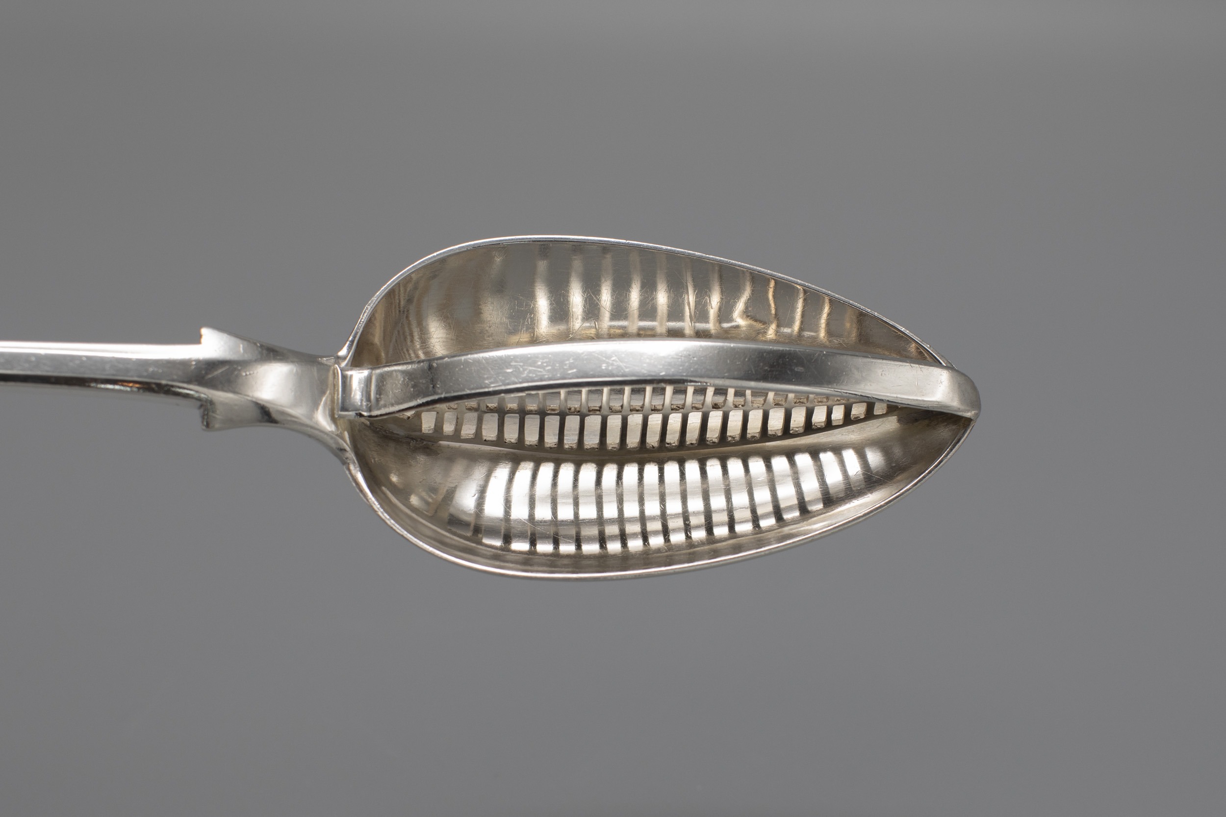 https://wylerantiques.com/wp-content/uploads/2023/09/wyler-antiques-Georgian-English-silver-strainer-spoon-detail1.jpg