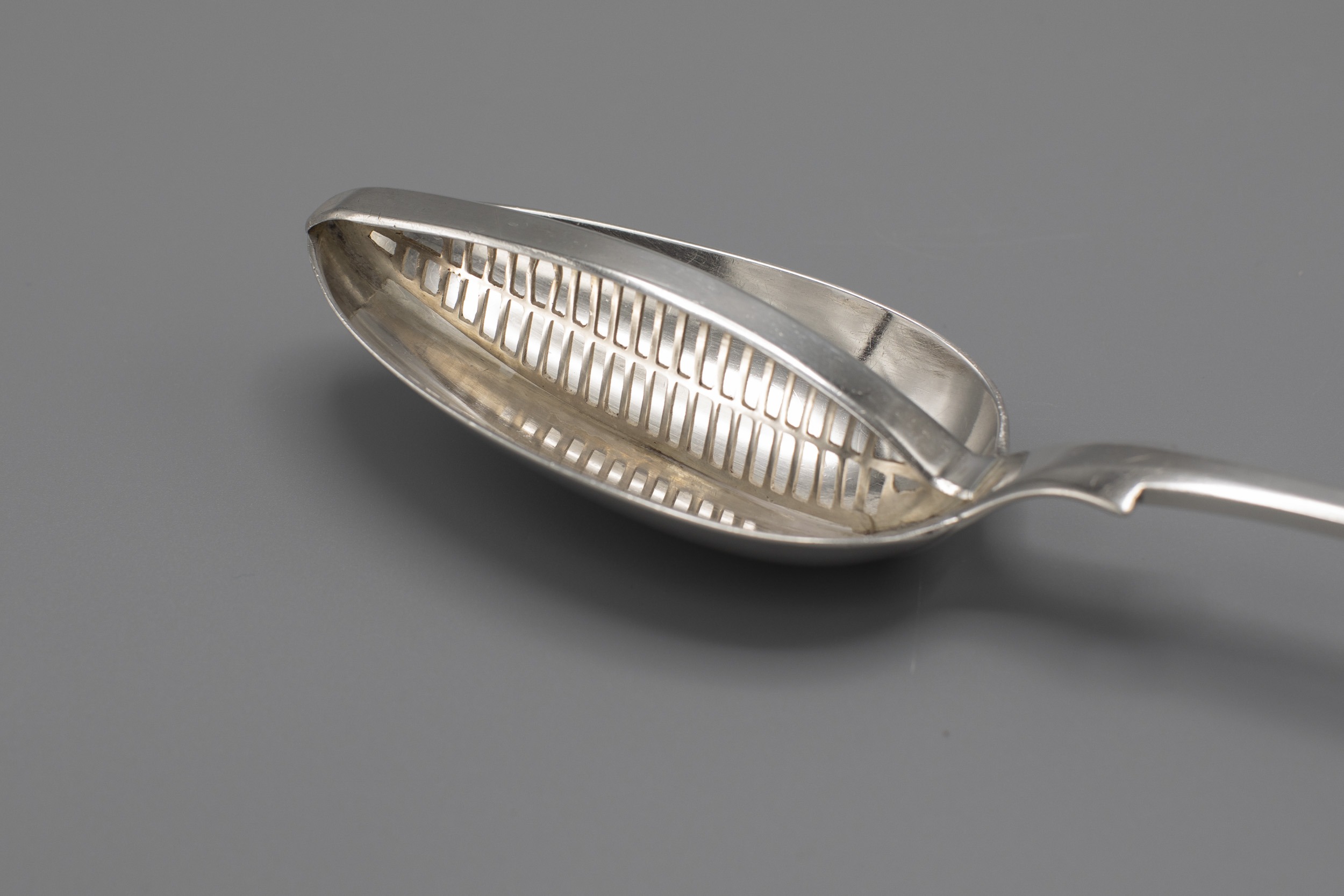 https://wylerantiques.com/wp-content/uploads/2023/09/wyler-antiques-Georgian-English-silver-strainer-spoon-detail2.jpg